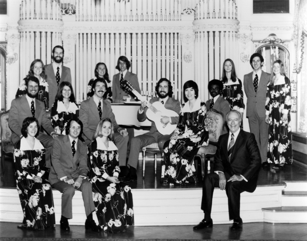 USC Chamber Singers, 1975. Dr. Charles H. Hirt is seated in the front row, far right. Donald Crockett, current Composition Department chair, is seated with the guitar.