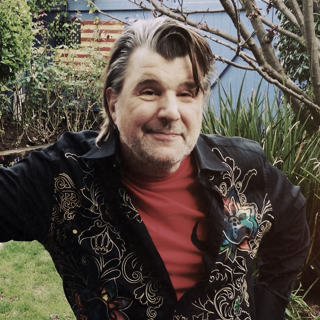 composer & conductor Christopher Young standing outside.