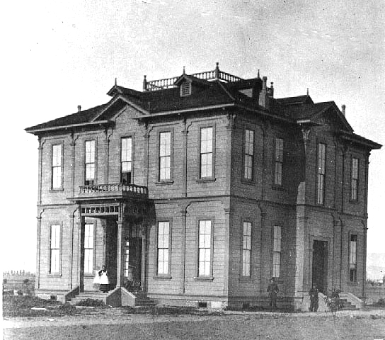 1880: More than 500 people gather on September 14th to watch the University Building corner stone laying for USC's very first structure, now known as Widney Hall.