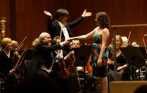 Adolphe shakes the hand of USC Thornton Robert Mann Chair in Strings and Chamber Music, Glenn Dicterow, after the NY Phil performance of "Dark Sand, Sifting Light."