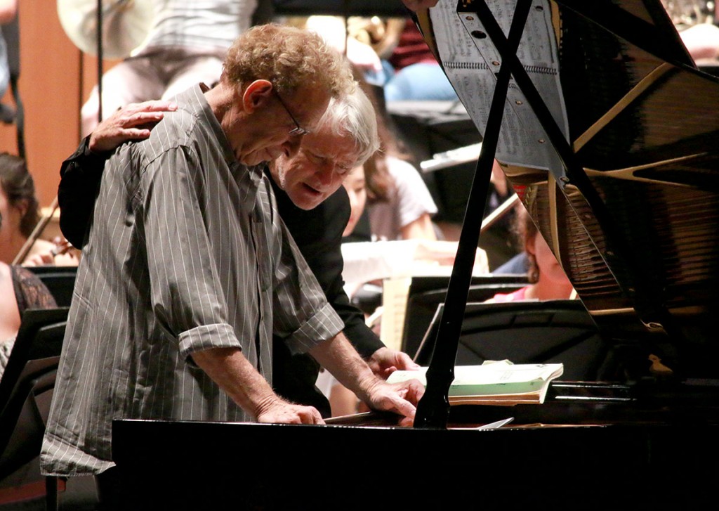 Pianist Daniel Pollack and conductor Carl St.Clair look over the score for Tchaikovsky's Piano Concerto No. 1. (Photo/Daniel Anderson).