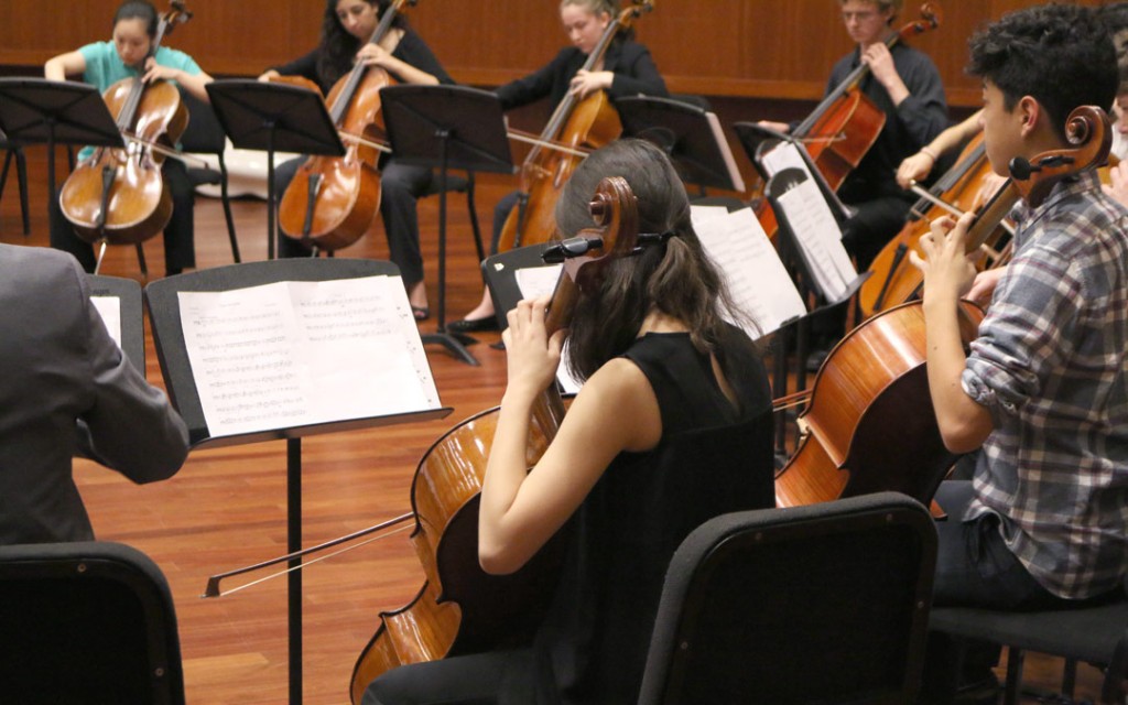 A dozen pre-college age cellists gathered for a workshop and performance May 22nd at USC’s Schoenfeld Symphonic Hall, under the guidance of Festival artist Antonio Lysy. (Photo by Daniel Anderson/USC)