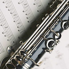 Photo of a clarinet on a sheet of music