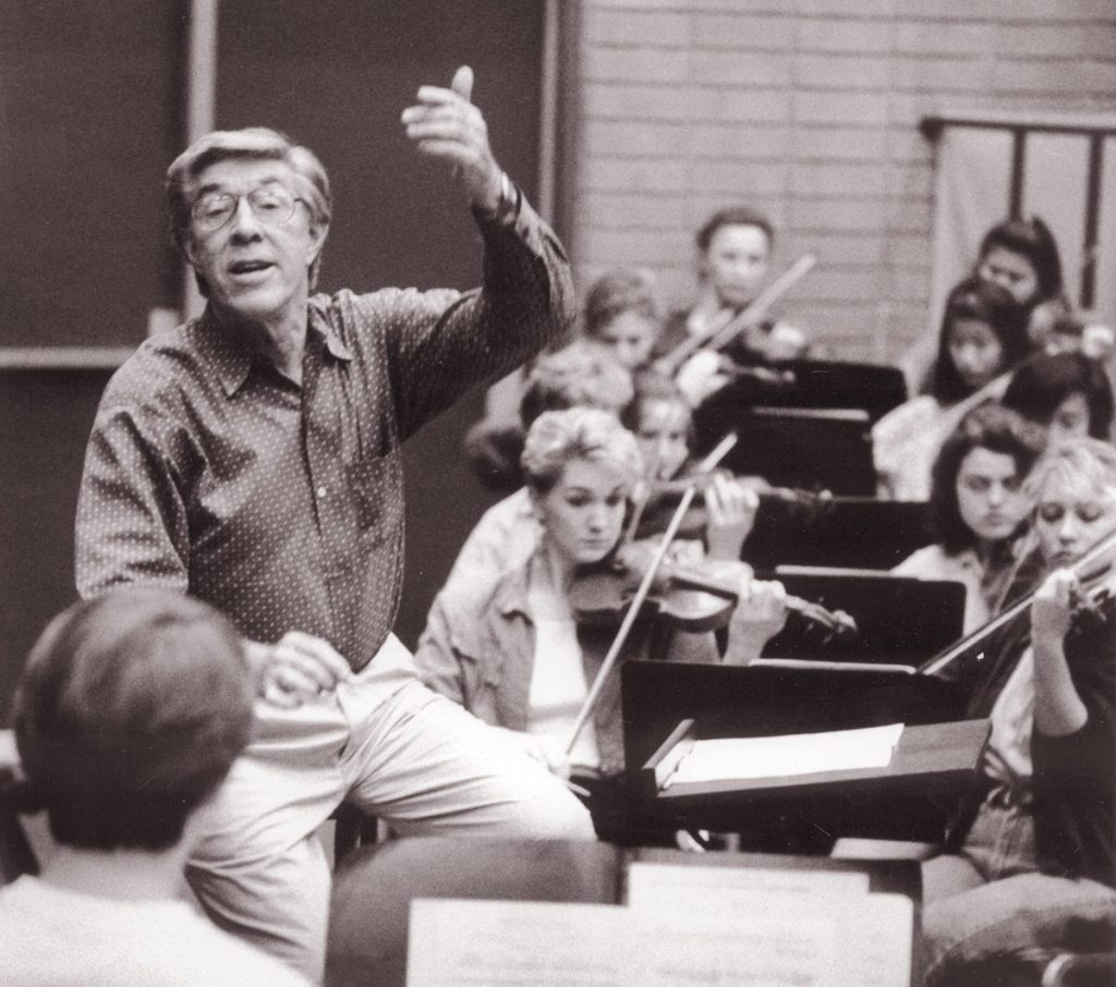 Daniel Lewis rehearsing the USC Thornton Symphony in the early 1990's.