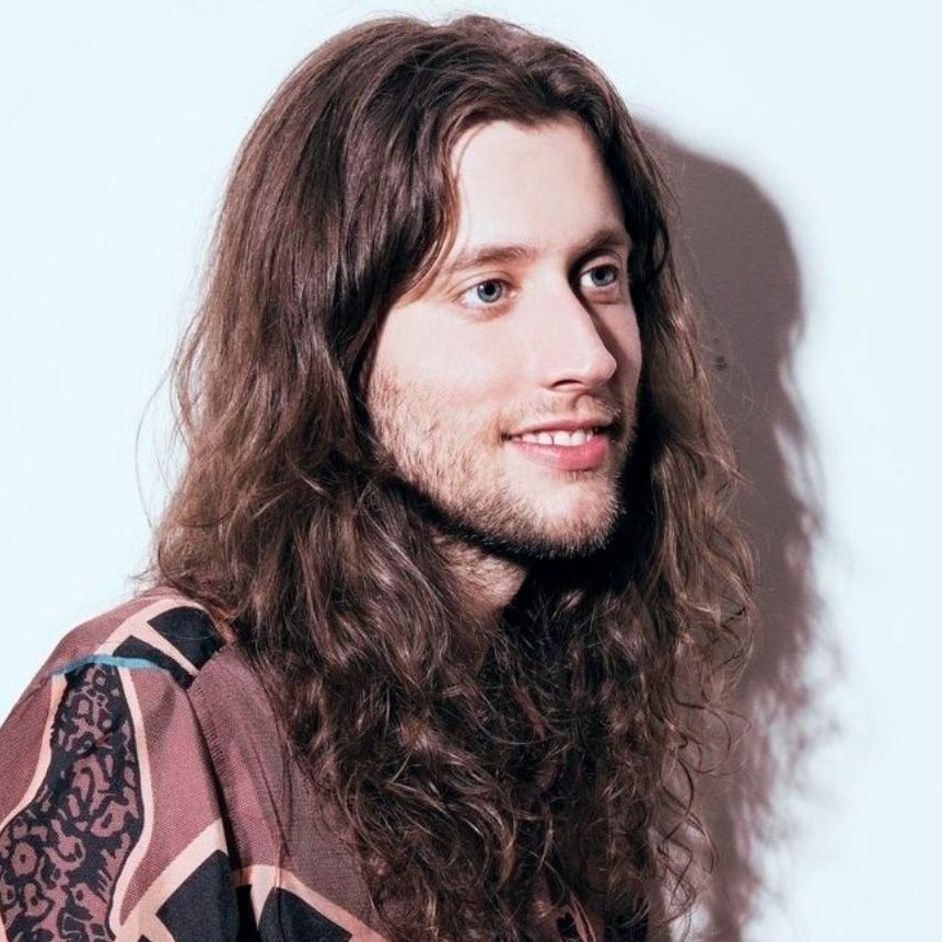 Photo of Ludwig Göransson on white backdrop