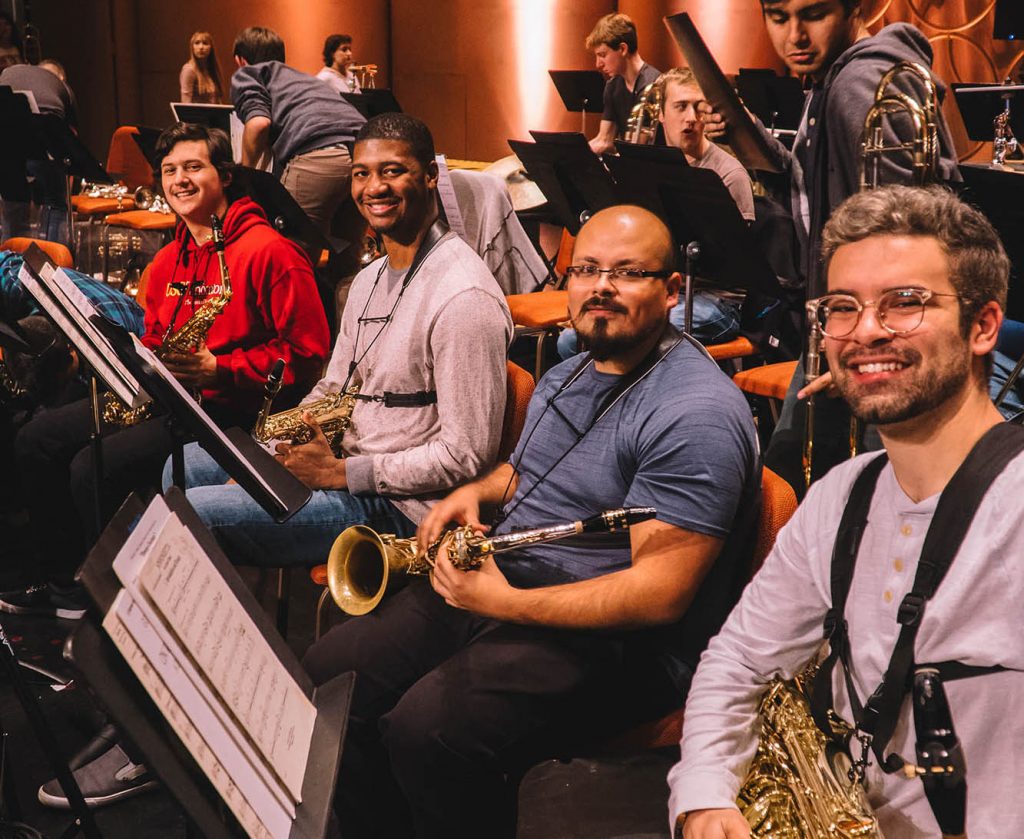 (From left) Francisco Cisneros, Royce Files, Edgar Melendez, Isaac Raven at a rehearsal at CBDNA 2019. (Photo by Chris O'Brien)