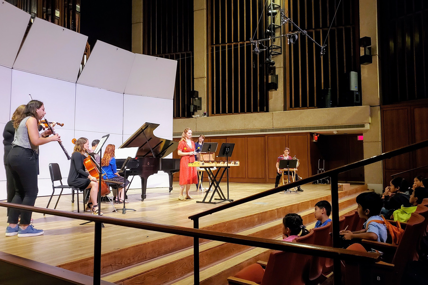 Rachel Campagna and faculty pictured performing in concert for kids.