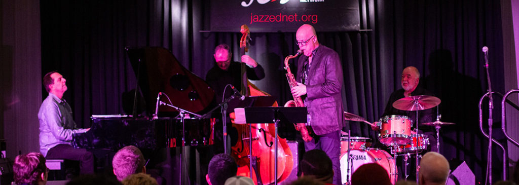 Photo of jazz faculty members playing on stage