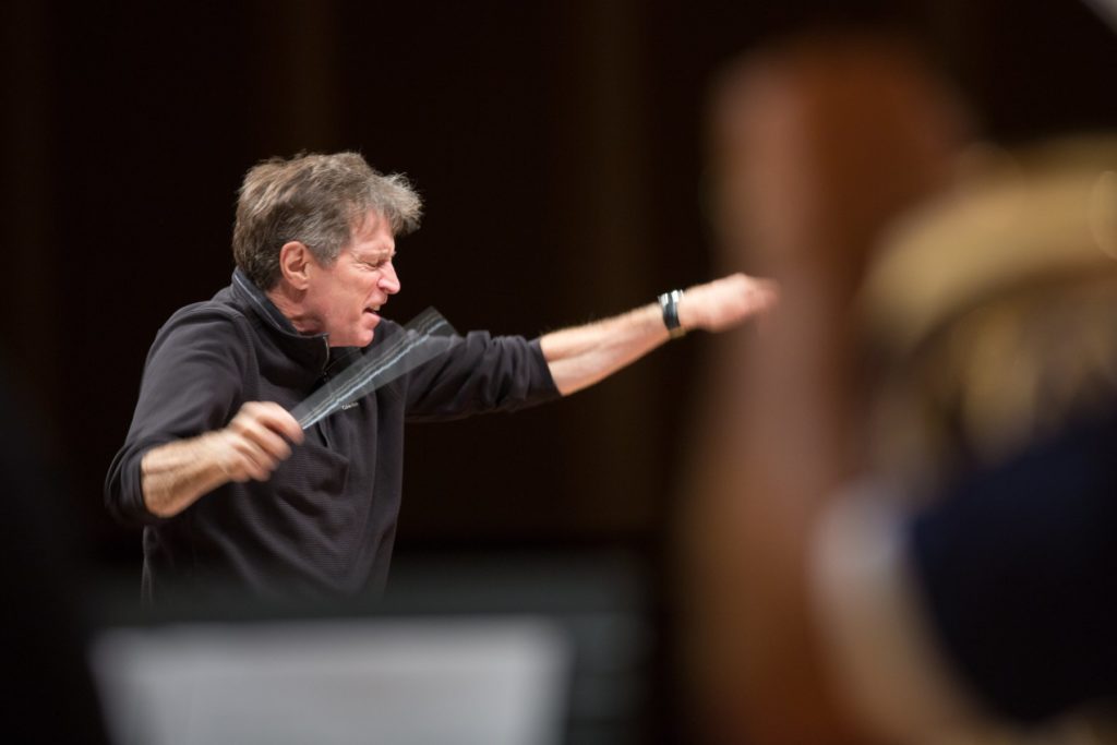 Photo of Frank Ticheli conducting an orchestra