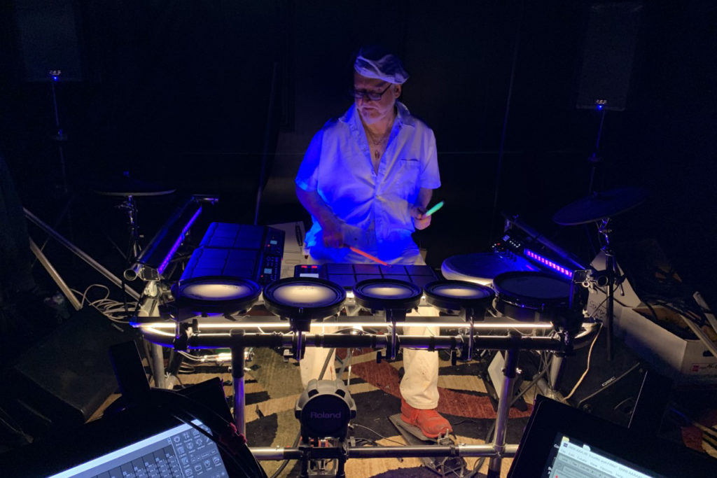 Photo of Ralph Loynachan performing on electronic music equipment