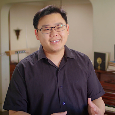 Jonathan Ong in his home speaking to camera