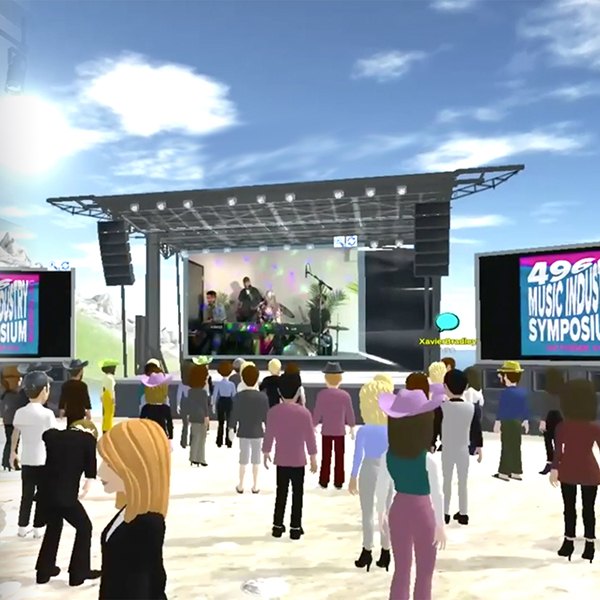 A virtual concert stage with students virtual avatars in the audience