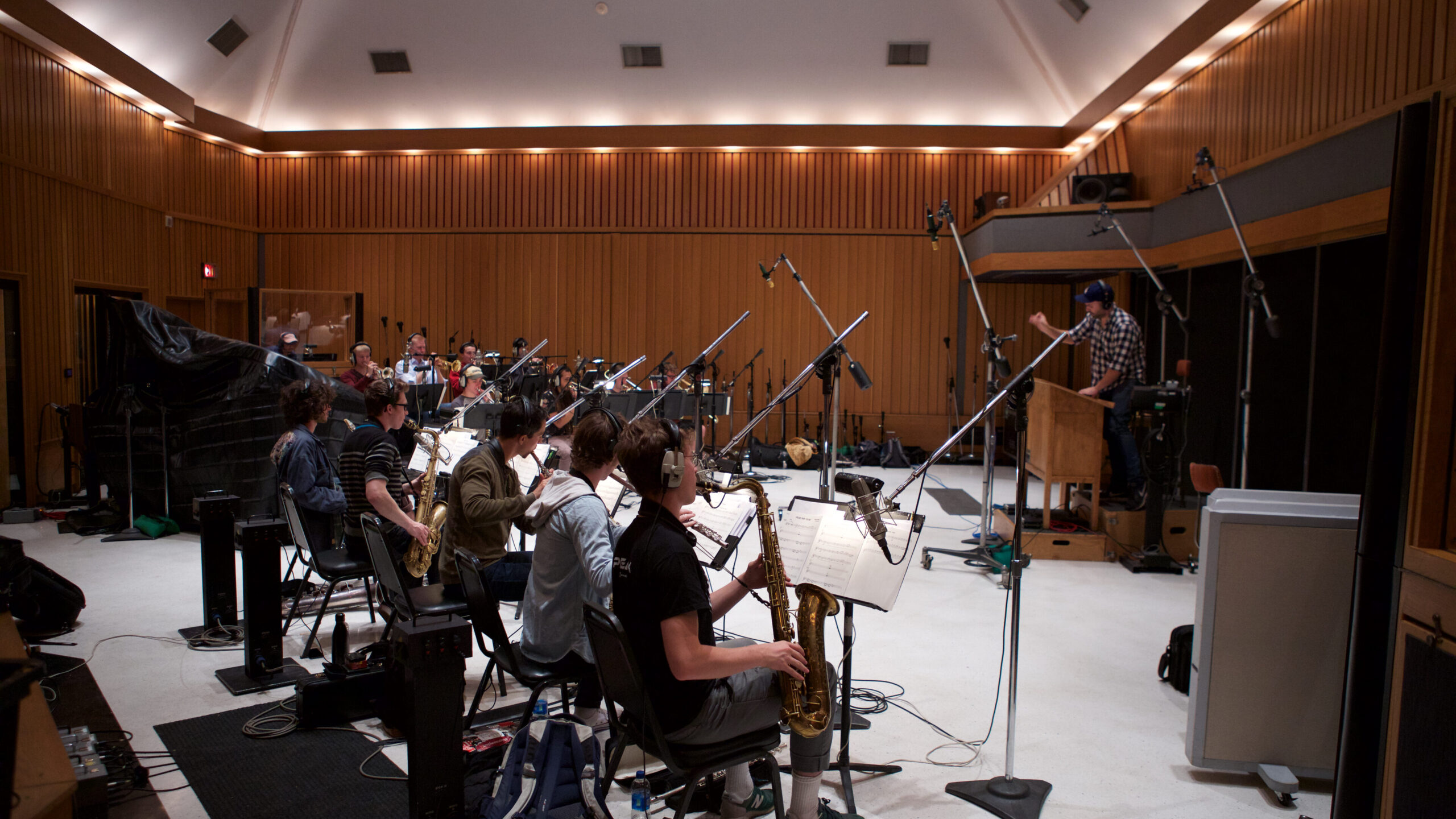 Student jazz musicians record reed instruments at Studio A, a recording studio in the Capitol Records building.