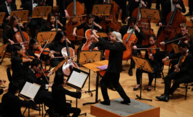 Carl St.Clair conducts the USC Thornton Symphony & Winds on stage at Walt Disney Concert Hall