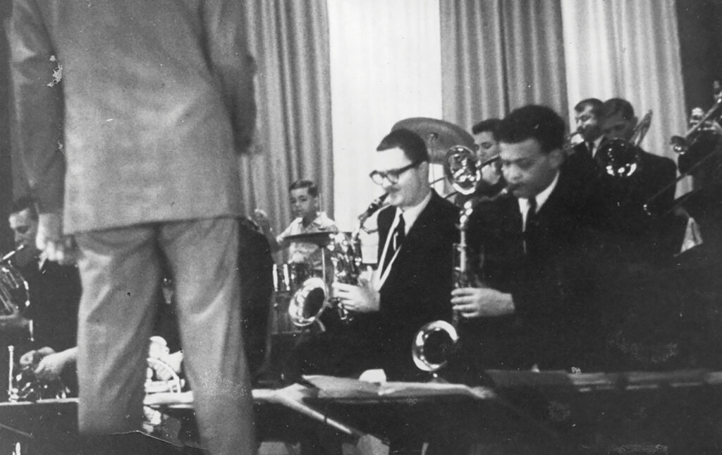 Black and white photo of jazz orchestra on stage in the 1960s
