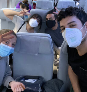 Students pose for a casual pic on a 11-hour plane ride from LA to Helsinki. 