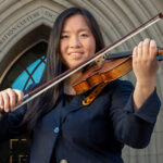 Photo of Emily Hsu playing the violin