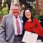 Photo of Peter Webster and Tina Huynh smiling outside