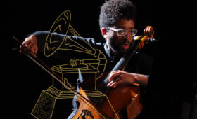 Photo of Seth Parker Woods performing with an illustration of a GRAMMY Award.
