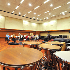 Photo of a music hall with timpani drums.