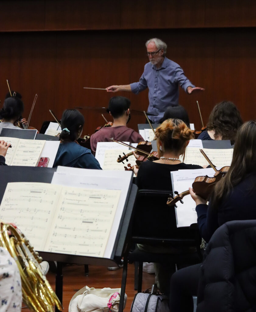 Donald Crockett leads the USC Thornton Symphony in an orchestral rehearsal for the New Music for Orchestra concert.