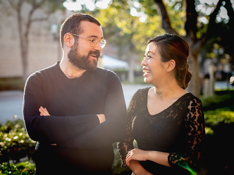 Two USC Thornton choral students conversing outdoors.