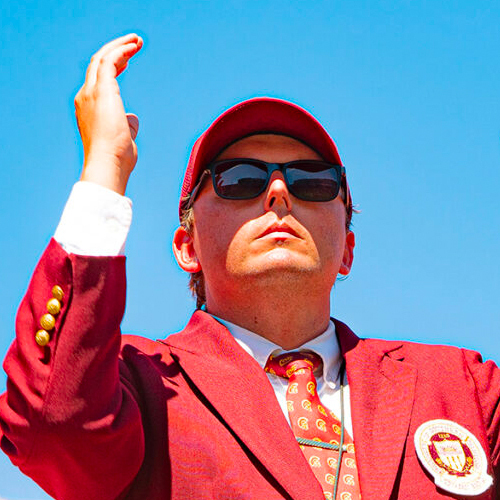 Photograph of Jacob Vogel conducting outdoors