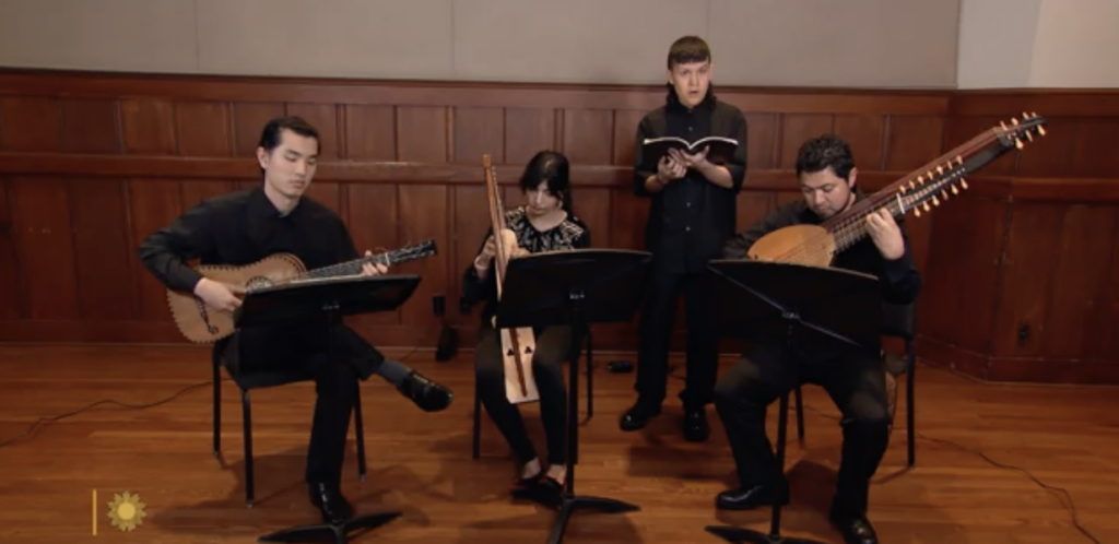 Photo of early music instrumentalists performing on stage in concert attire for CBS Sunday Morning specials.