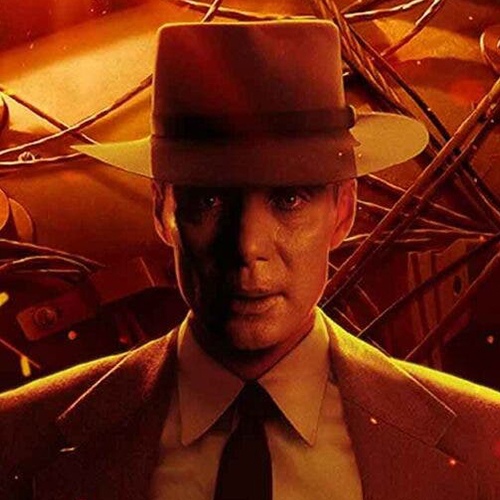 Movie poster for the film Oppenheimer, a man in a hat staring into the camera.