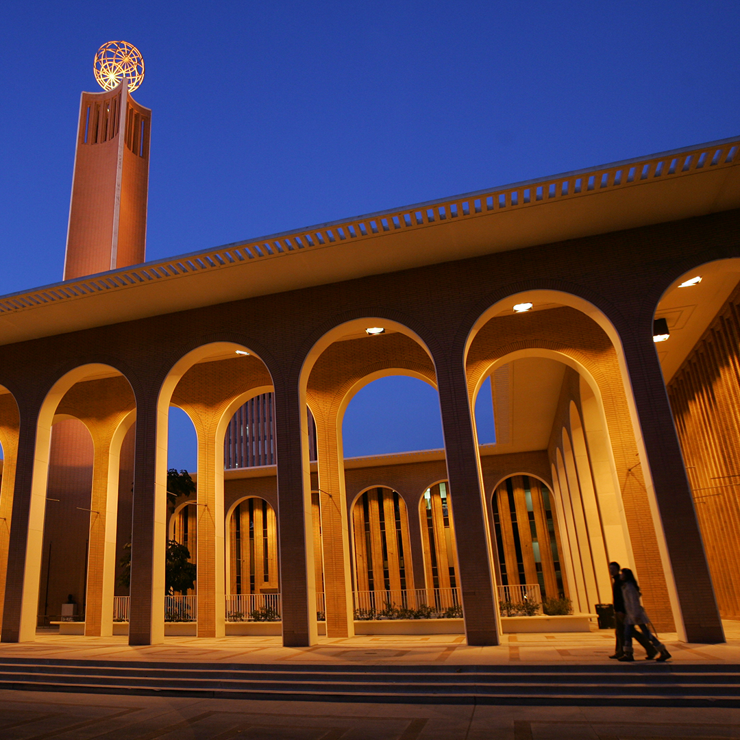 Photo of a college campus at night.