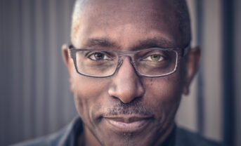 American keyboard player and vocalist Greg Phillinganes looking into the camera.
