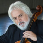 Photo of Andrew Shulman playing a cello.