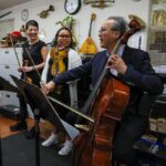 Cellist Yo-Yo Ma and violinist Anne Akiko Meyers perform with students.
