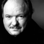 Black & white photo of pianist John Perry