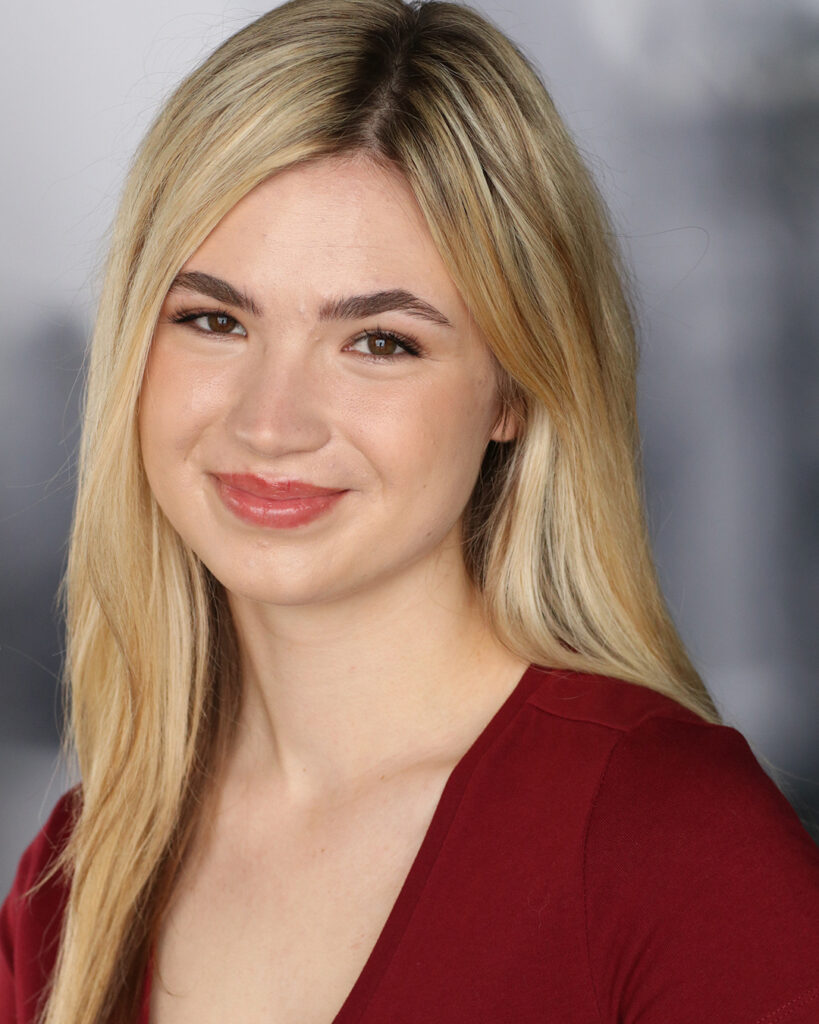 Headshot of Oliviana Marie.