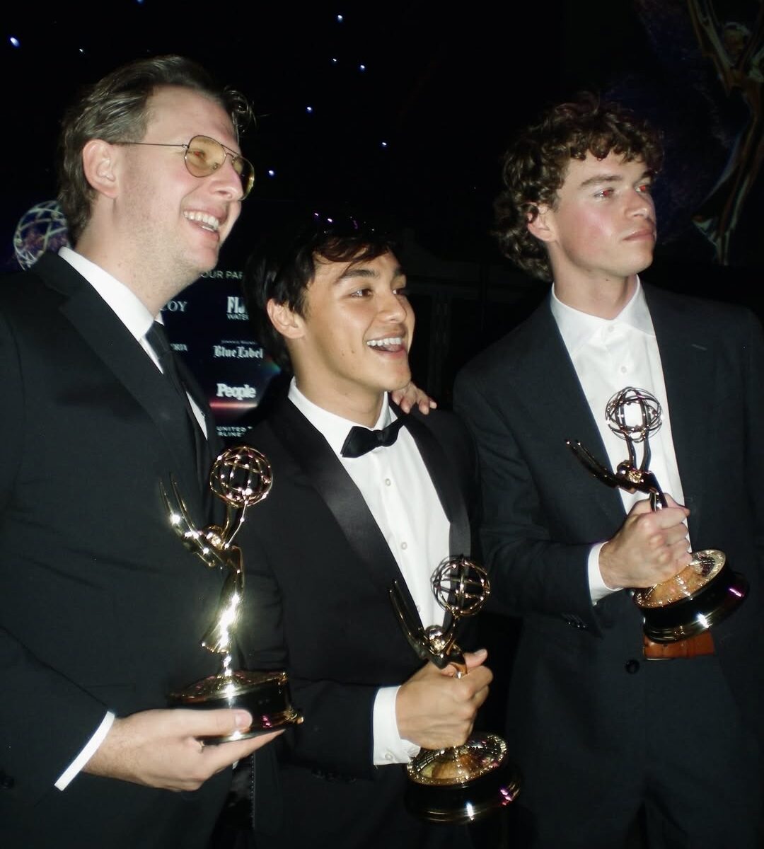 Mic Ferrante and George Tyler Heffley hold their Emmy Awards after winning at the Los Angeles Area Emmys.