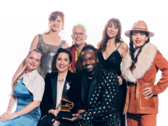 vocal group Tonality poses for a photo, holding their Grammy award