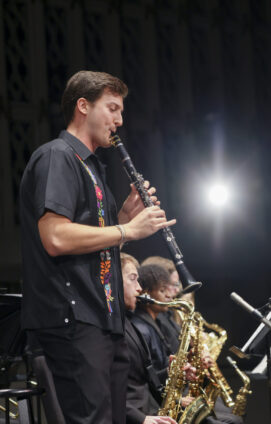 A clarinetist takes a solo during an ensemble performance.