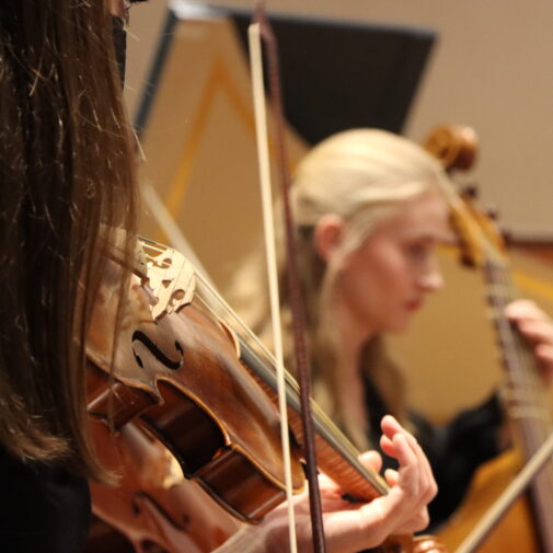 String players at a Baroque Sinfonia concert.