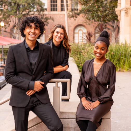 trio of choral students pose on the USC campus